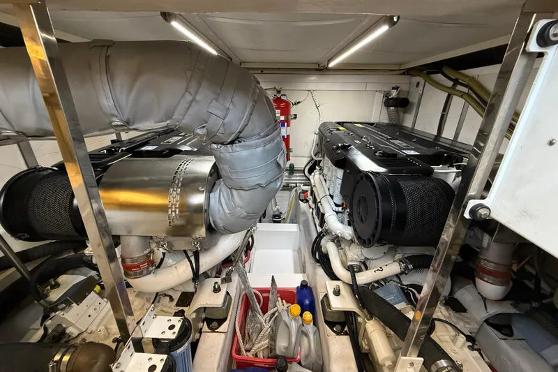 Marckeric Yacht Photos Pics Engine room of 2012 Fairline Squadron 58 yacht, showcasing dual engines and equipment.