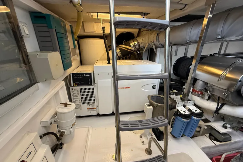 Marckeric Yacht Photos Pics Engine room of 2012 Fairline Squadron 58 yacht with Cummins Onan generator.
