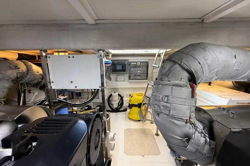 Marckeric Yacht Photos Pics Engine room of 2012 Fairline Squadron 58 yacht, featuring machinery and equipment.