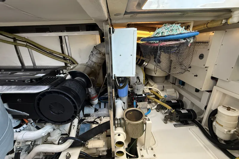 Marckeric Yacht Photos Pics Engine room of 2012 Fairline Squadron 58 yacht, showcasing mechanical components and equipment.