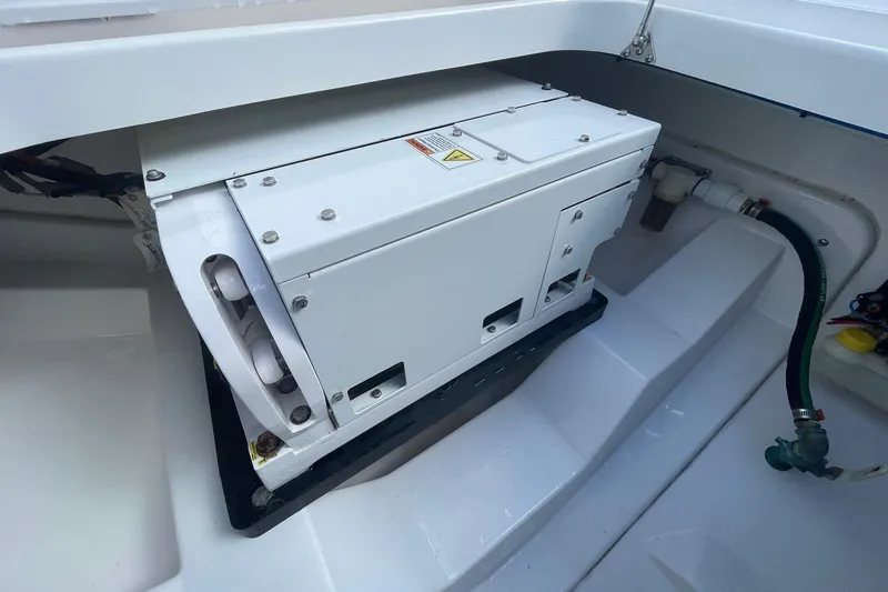  Yacht Photos Pics 2022 Everglades 335 Center Console boat engine compartment with installed equipment.