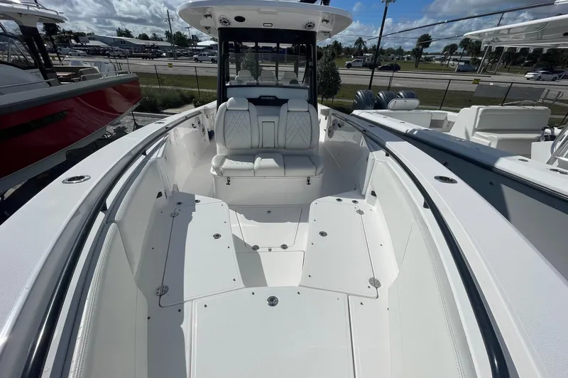  Yacht Photos Pics 2022 Everglades 335 Center Console boat with spacious seating and sleek design.