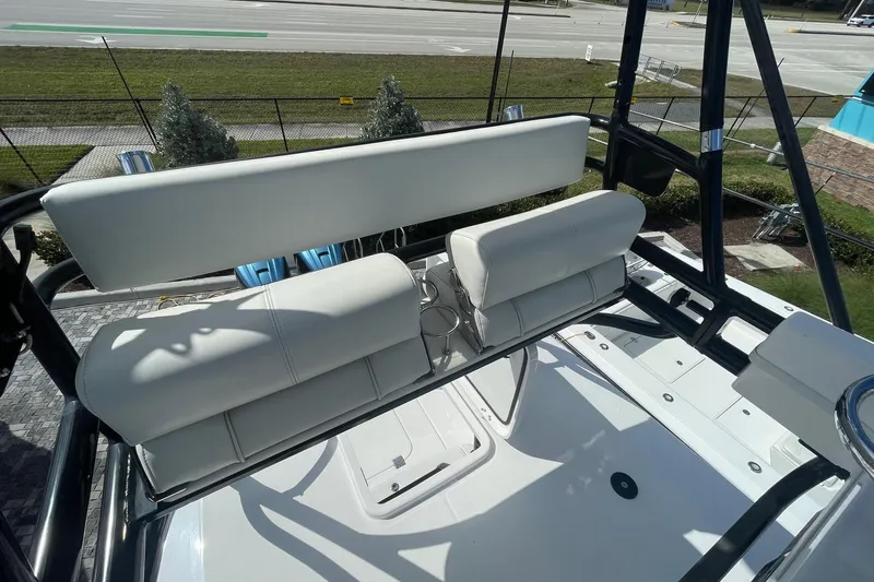  Yacht Photos Pics 2022 Everglades 335 Center Console boat with white seating and sleek design.