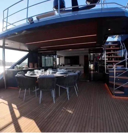  Yacht Photos Pics Luxury yacht Inace AVENTURA 106, 2027 model, featuring elegant outdoor dining area.