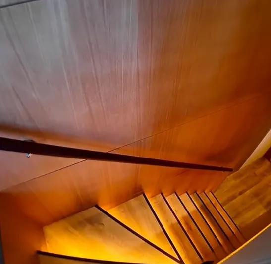  Yacht Photos Pics Wooden staircase with warm lighting on Inace AVENTURA 106 yacht, 2027 model.