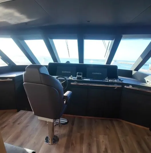  Yacht Photos Pics Modern helm of 2027 Inace AVENTURA 106 yacht with panoramic windows and advanced navigation systems.