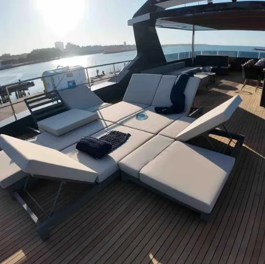  Yacht Photos Pics Luxurious deck of 2027 Inace AVENTURA 106 yacht with adjustable sun loungers.