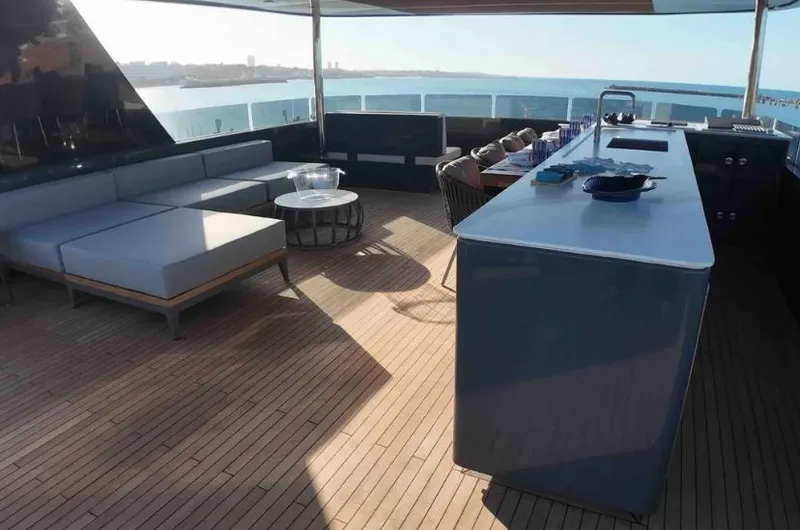  Yacht Photos Pics Luxurious deck of 2027 Inace AVENTURA 106 yacht with modern seating and ocean view.
