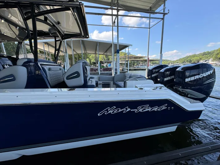 Yacht Photos Pics 2019 Nor-Tech 390 Sport Center Console boat docked with Mercury engines.