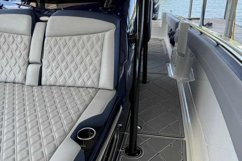  Yacht Photos Pics 2019 Nor-Tech 390 Sport Center Console with diamond-stitched seating and sleek deck design.