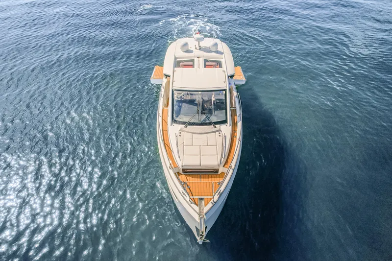 Equanimity Yacht Photos Pics 2023 Jeanneau DB43 yacht cruising on open water, aerial view.
