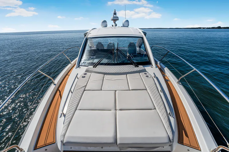 Equanimity Yacht Photos Pics 2023 Jeanneau DB43 yacht with sun deck on calm ocean waters.