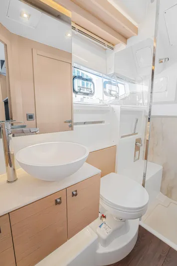 Equanimity Yacht Photos Pics 2023 Jeanneau DB43 yacht bathroom with modern fixtures and elegant design.