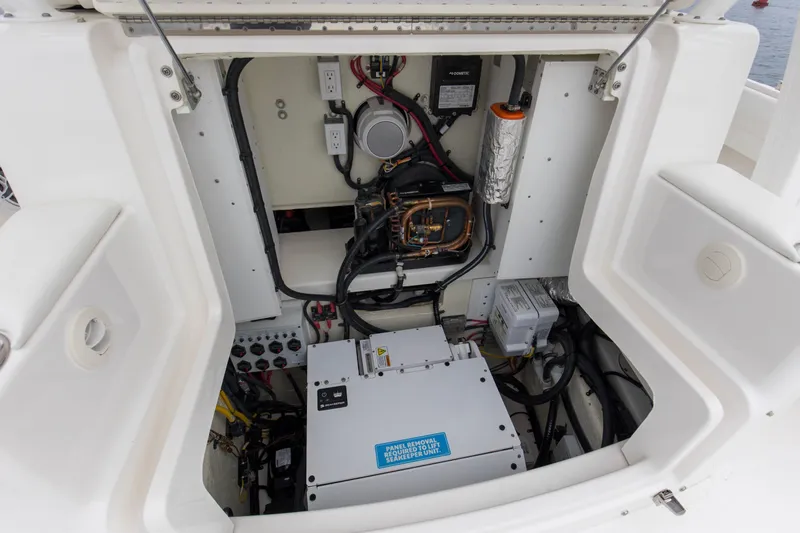  Yacht Photos Pics 2024 Regulator 37 boat engine compartment with electrical components and wiring.