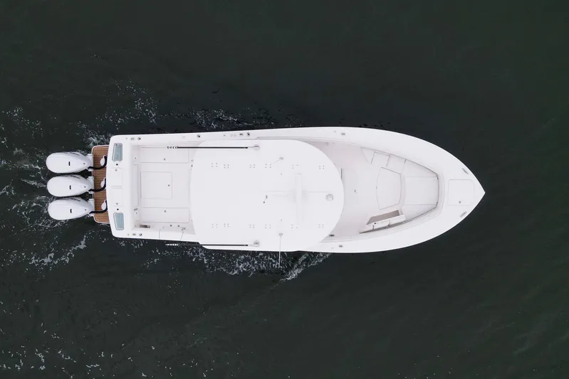  Yacht Photos Pics Aerial view of 2024 Regulator 37 boat cruising on water.