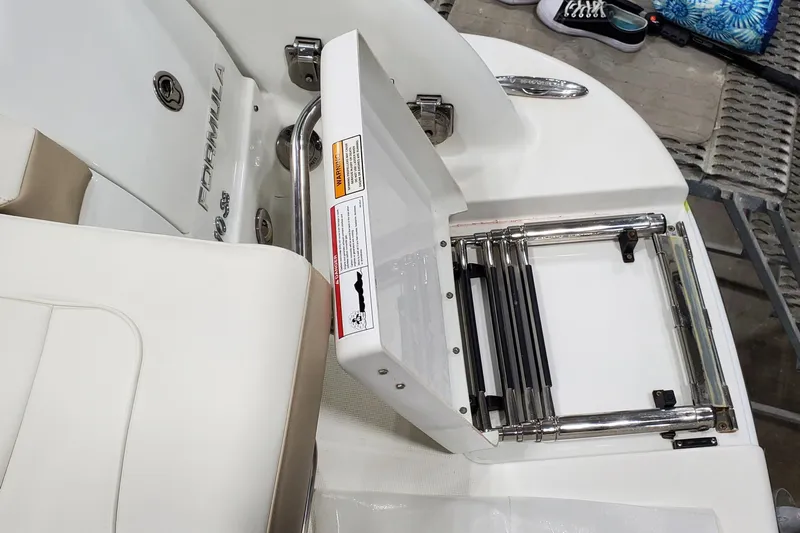  Yacht Photos Pics 2012 Formula 310 Sun Sport boat with foldable stainless steel ladder.