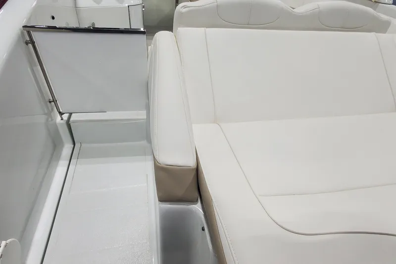  Yacht Photos Pics 2012 Formula 310 Sun Sport boat interior with white seating and sleek design.