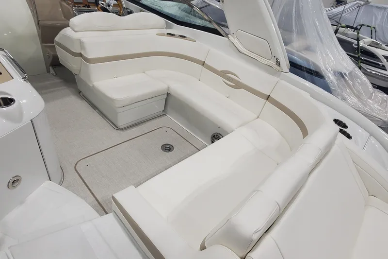  Yacht Photos Pics 2012 Formula 310 Sun Sport boat interior with white seating and elegant design.