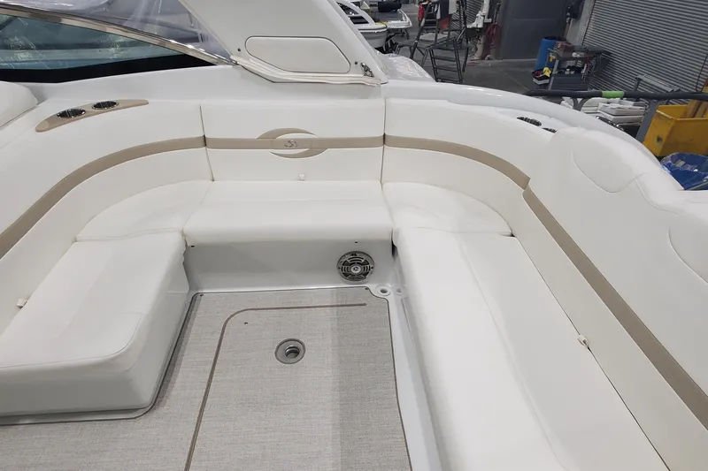  Yacht Photos Pics 2012 Formula 310 Sun Sport boat interior with white seating and beige accents.