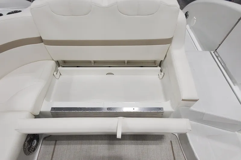  Yacht Photos Pics 2012 Formula 310 Sun Sport boat interior with white seating and storage compartment.