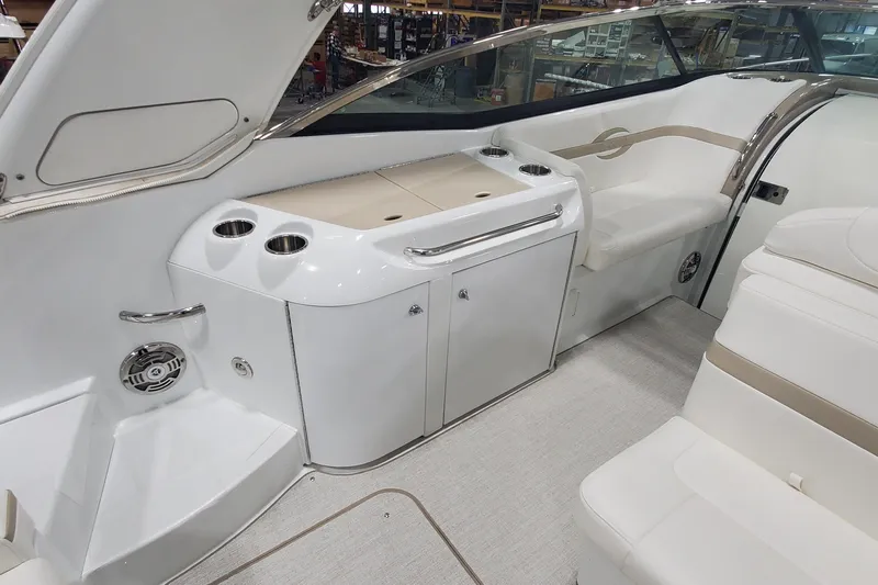  Yacht Photos Pics Interior of a 2012 Formula 310 Sun Sport boat, featuring seating and storage.