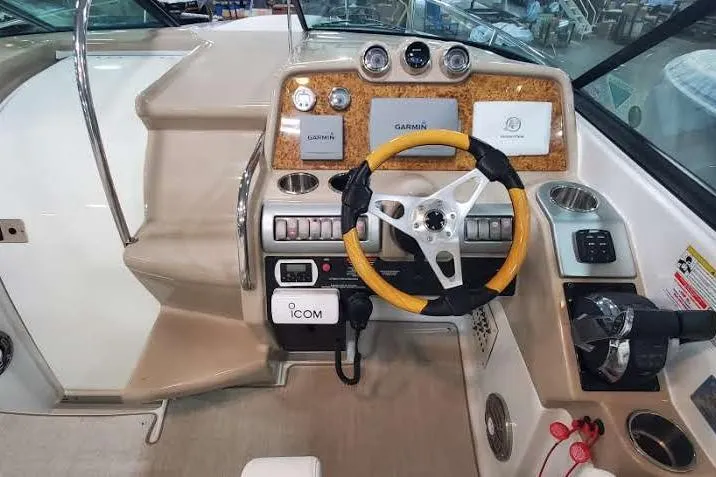  Yacht Photos Pics 2012 Formula 310 Sun Sport boat dashboard with Garmin navigation and Icom communication systems.