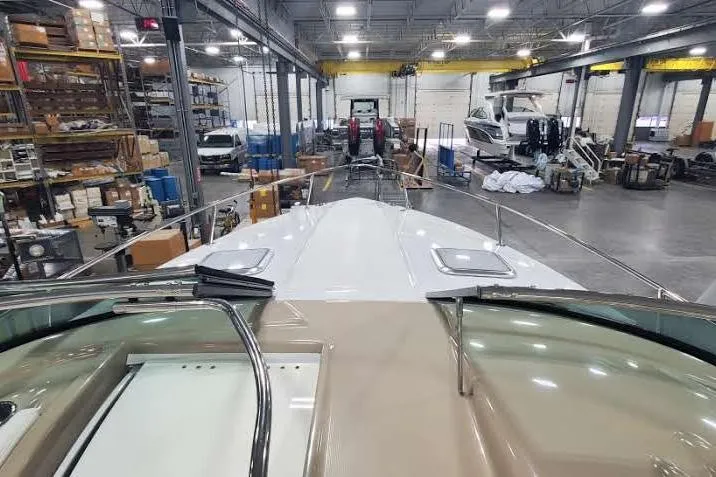  Yacht Photos Pics 2012 Formula 310 Sun Sport boat in a spacious indoor storage facility.