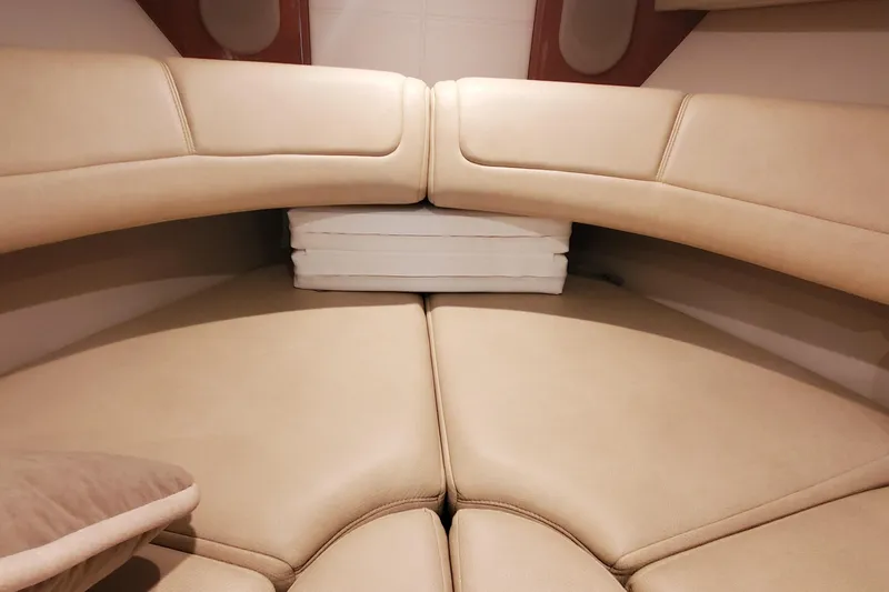  Yacht Photos Pics 2012 Formula 310 Sun Sport cabin interior with beige leather seating.