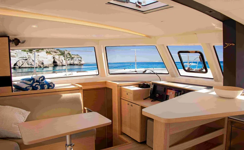 Double Memory Yacht Photos Pics Interior of 2023 Nautitech 44 yacht with ocean view through large windows.