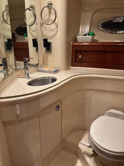 Why Knot Yacht Photos Pics Luxurious bathroom in a 2006 Meridian 411 Sedan yacht.