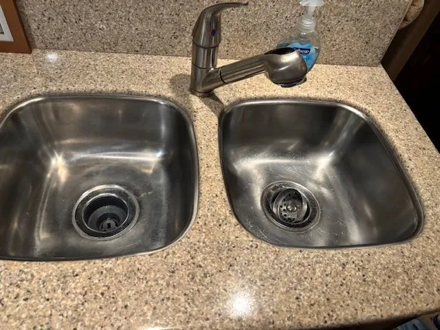 Why Knot Yacht Photos Pics Stainless steel double sink on granite countertop, Meridian 411 Sedan 2006.