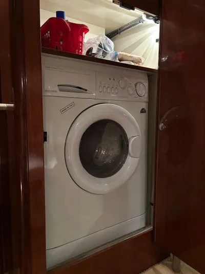 Why Knot Yacht Photos Pics Washing machine inside a 2006 Meridian 411 Sedan.