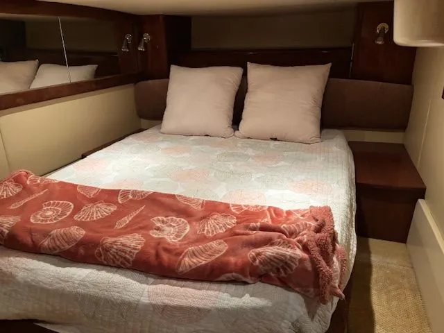 Why Knot Yacht Photos Pics Interior of a 2006 Meridian 411 Sedan with cozy bed.