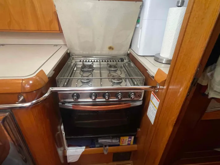 Karisma Yacht Photos Pics 2006 Jeanneau Sun Odyssey 45 yacht kitchen with stove and oven.