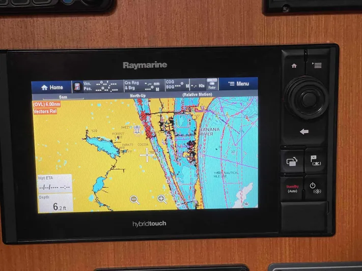 Karisma Yacht Photos Pics Raymarine navigation system on 2006 Jeanneau Sun Odyssey 45 sailboat, displaying coastal map.