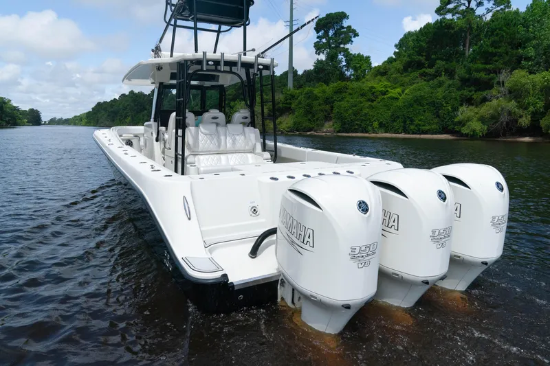  Yacht Photos Pics 2018 HCB 39 Speciale boat with triple Yamaha engines on a scenic river.