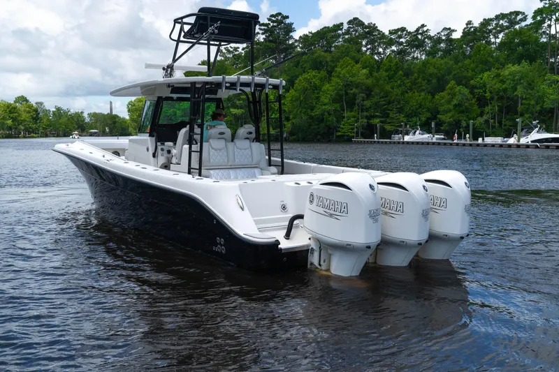  Yacht Photos Pics 2018 HCB 39 Speciale boat with triple Yamaha engines on a scenic river.