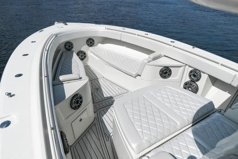  Yacht Photos Pics Luxurious 2018 HCB 39 Speciale boat interior with white seating and ocean view.