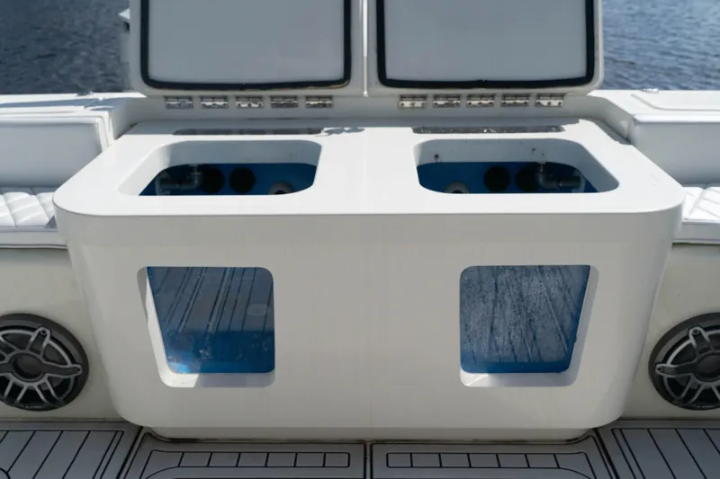  Yacht Photos Pics 2018 HCB 39 Speciale boat with dual livewells and speakers on deck.