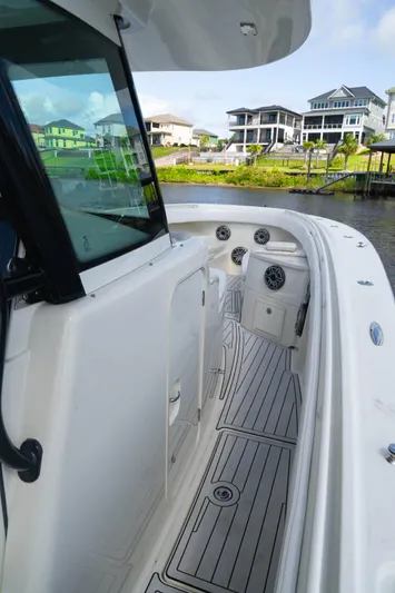  Yacht Photos Pics 2018 HCB 39 Speciale boat with sleek deck design and waterfront view.