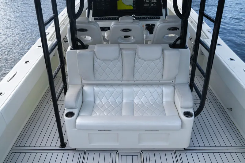  Yacht Photos Pics 2018 HCB 39 Speciale boat interior with white quilted seating and sleek design.