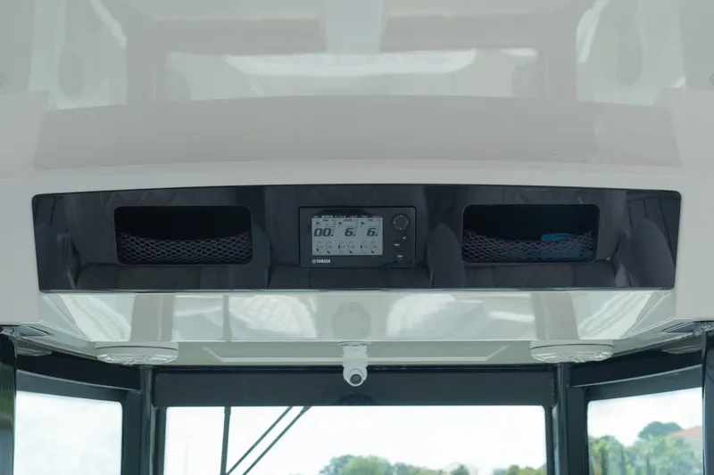  Yacht Photos Pics 2018 HCB 39 Speciale boat dashboard with digital display and storage compartments.