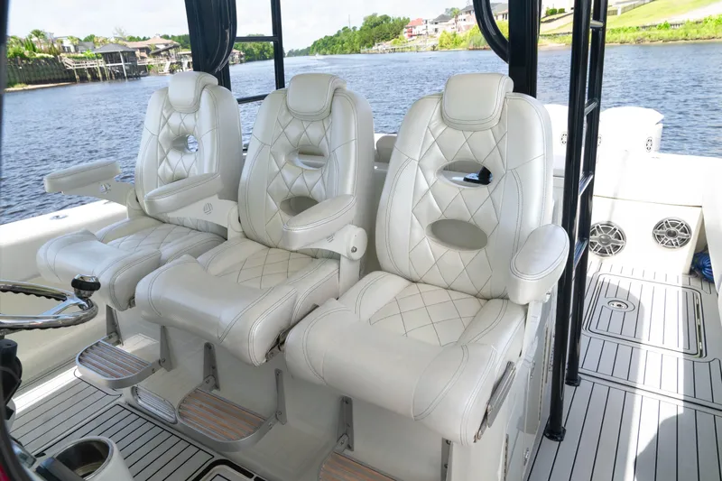  Yacht Photos Pics Luxurious seating on a 2018 HCB 39 Speciale boat, featuring white leather upholstery.