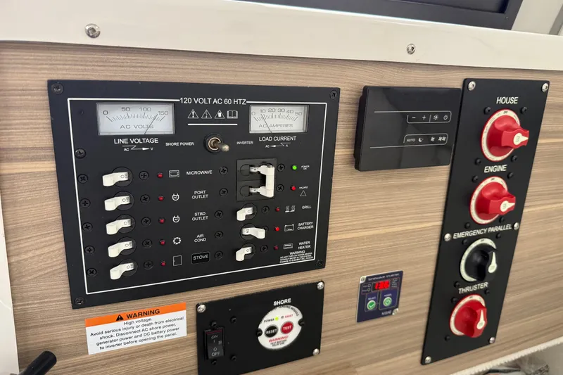  Yacht Photos Pics 2024 Solara S-250 Coupe electrical control panel with voltage and current meters.