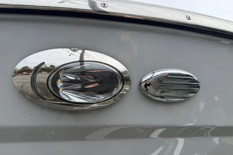  Yacht Photos Pics 2024 Solara S-250 Coupe chrome detail with LED lights and sleek design.