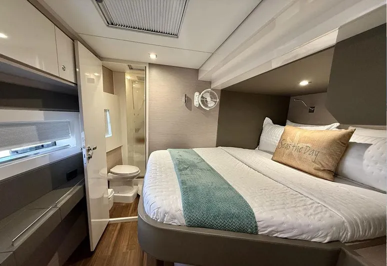  Yacht Photos Pics Luxurious bedroom in 2025 Aventura 56 Motor Yacht with ensuite bathroom.