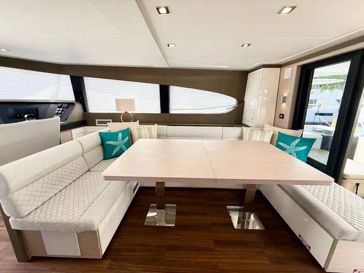 Yacht Photos Pics Luxurious interior of 2025 Aventura 56 Motor Yacht with elegant seating and modern decor.