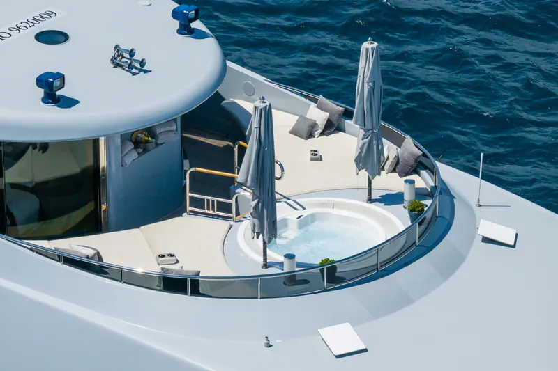 After You Yacht Photos Pics Luxurious Heesen 55m yacht deck with jacuzzi, umbrellas, and ocean view, 2011 model.