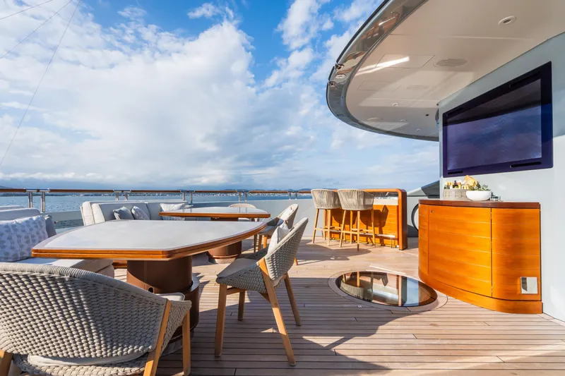 After You Yacht Photos Pics Luxurious outdoor deck of 2011 Heesen 55m yacht with seating and ocean view.