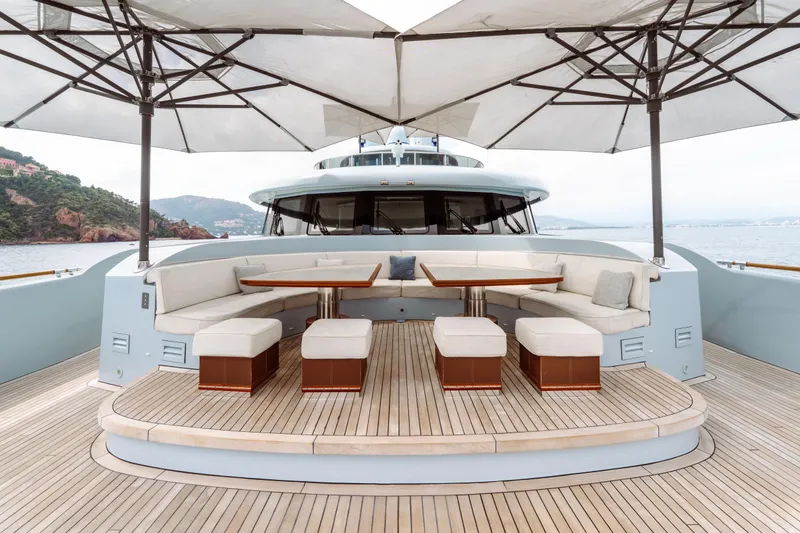 After You Yacht Photos Pics Luxurious outdoor seating on 2011 Heesen 55m yacht with umbrellas and ocean view.